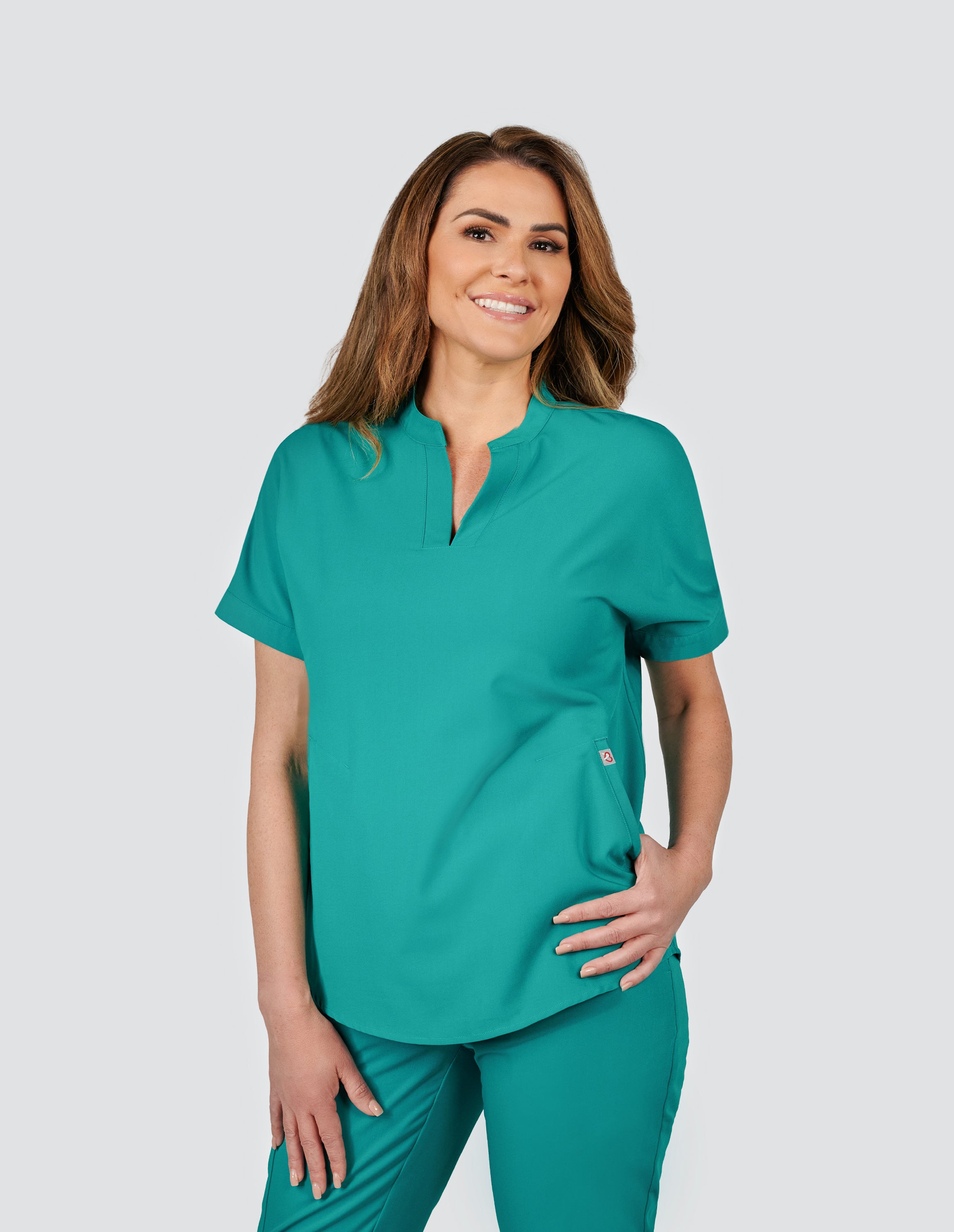 Orchid Three-Pocket Scrub Top in Teal designed for women
