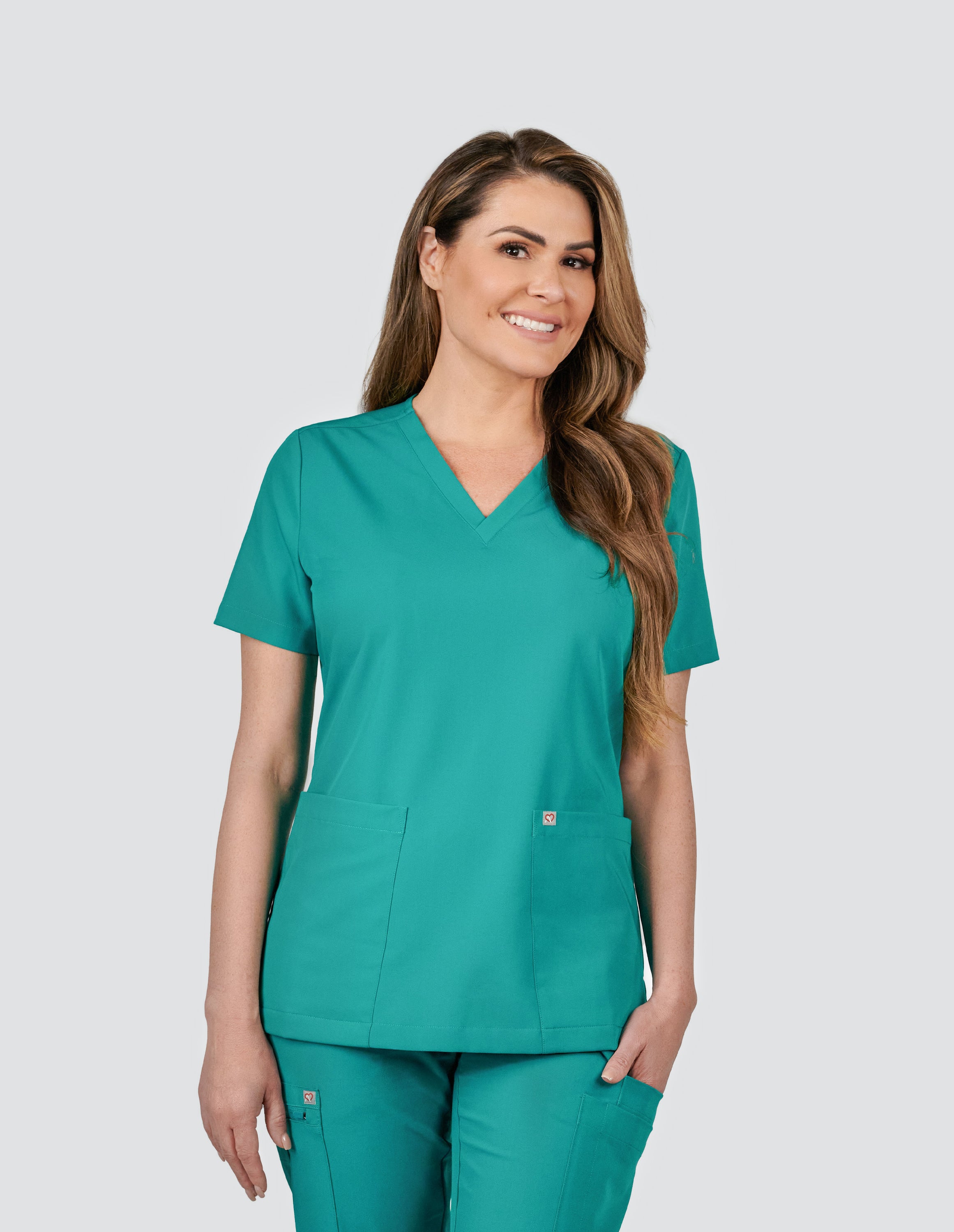 Iris Five-Pocket Scrub Top in Teal designed for women.